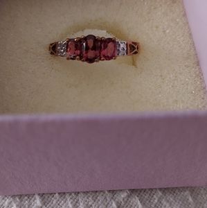 Ladies size 6 pink TOURMALINE yellow gold ring.  Never worn. Comes with box.
